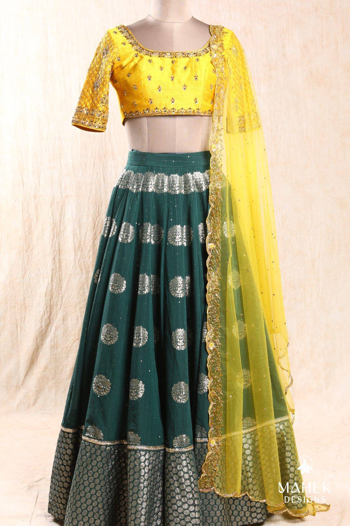 Mustard yellow and bottle green lehenga